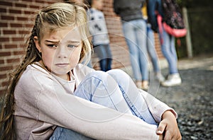 Sad intimidation moment Elementary Age Bullying in Schoolyard