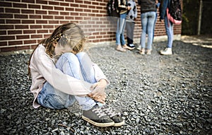 Sad intimidation moment Elementary Age Bullying in Schoolyard