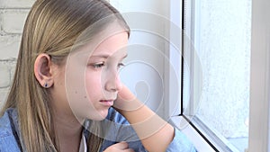 Sad Kid Looking on Window, Unhappy Child, Bored Thoughtful Girl, Sadness on Teenager Face, Coronavirus Pandemic Crises