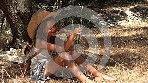 Sad Kid Playing in Olive Orchard, Meditative Kid, Bored Child Relaxing by Tree in Park, Unhappy Teenager Farmer Girl on Meadow in