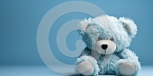 sad light blue teddy bear, on a blue background, blue monday, copy space, banner