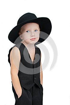 Sad little boy in a hat