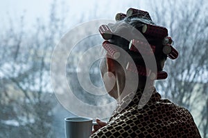 sad lonely old woman look next to  window allone depressed