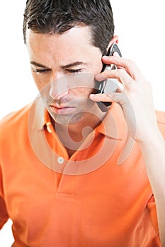 Sad male talking on cellphone