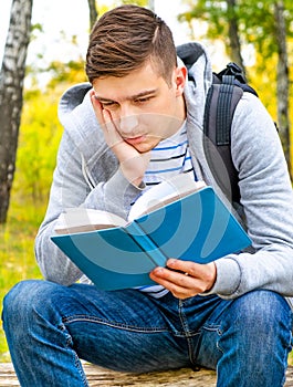 Sad Man with a Book