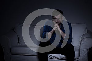 Sad man on the sofa