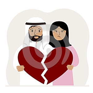 A sad man and woman are holding pieces of a broken red heart in their hands. Broken heart.