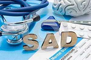 SAD medical abbreviation meaning seasonal affective disorder, depression could during seasons with little light. Word SAD is surro