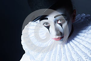 Sad mime Pierrot, closeup portrait