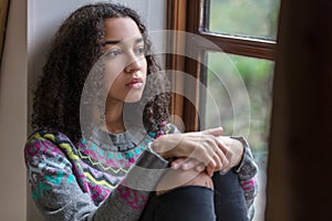 Sad Mixed Race African American Teenager Woman photo