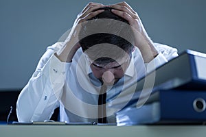 Sad, overworked businessman