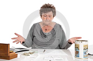 Sad pensioner woman have money problems - poverty in the age.