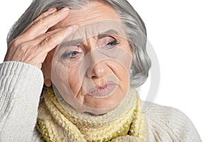 Sad senior woman isolated on white background