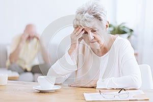 Sad senior woman after quarrel