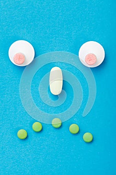 Sad smileyface made of pills