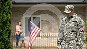 Sad soldier leaving for war, upset family staying home, dangerous occupation