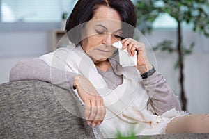 sad stressed old middle aged woman widow mourning