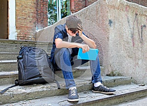 Sad Student with the Book