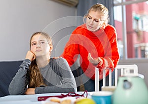 Sad teen girl after discord with her mother