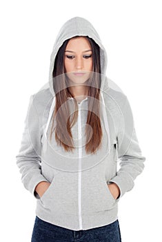 Sad teenager girl with gray sweatshirt hooded