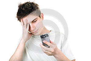 Sad teenager with phone