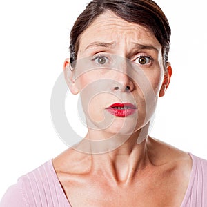 Sad tensed woman expressing anxiety and consternation photo
