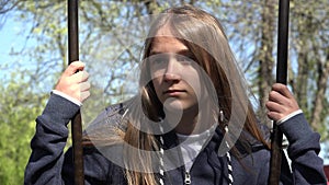 Sad Thoughtful Girl in Swing, Unhappy Child in Park Depressed Kid Not Playing, Depression of Adolescents in Coronavirus Pandemic