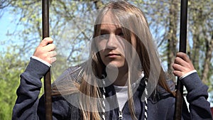 Sad Thoughtful Kid in Swing, Unhappy Child in Park Depressed Girl Not Playing, Depression of Adolescents in Coronavirus Pandemic