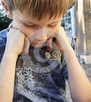 Sad thoughtful worried young boy