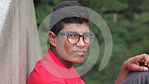 Sad Unemotional Teen Boy Wearing Glasses