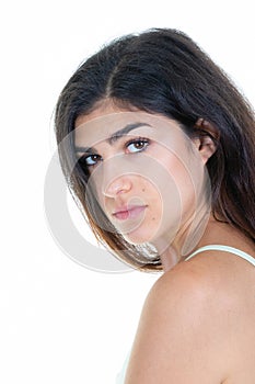 Sad and unhappy young woman portrait pretty brunette girl with look angry face on white background