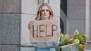 Sad upset stressed caucasian business woman distressed fired poor lady female frustrated girl student standing outdoors