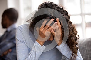 Sad wife crying feeling desperate after fight with husband