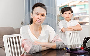 Sad woman after discord with son