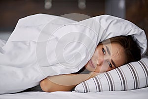 Sad woman doesn`t want to get up