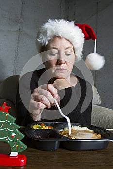 Sad Woman Eating Christmas Dinner Alone