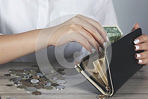 Sad woman hand wallet with money