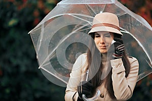 Sad Woman Holding Umbrella in Autumn Rain Crying