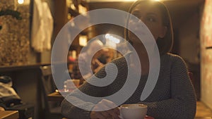 Sad woman sitting in cafe, painfully experiencing break-up, loneliness, crisis