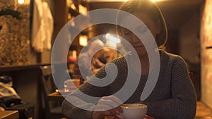 Sad woman sitting in cafe, painfully experiencing break-up, loneliness, crisis