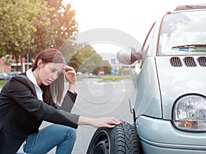 Sad woman after vehicle breakdown