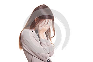 Sad young Asian woman cry with palm to face.