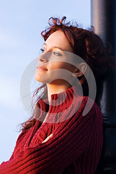 Sad young fashion woman looking away outdoor