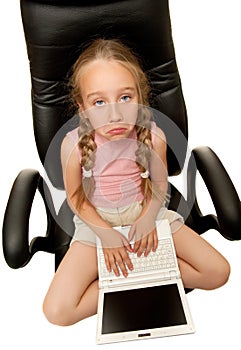 Sad young girl with laptop