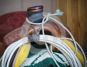 A Saddle Blanket, a Lariat and a Saddle photo
