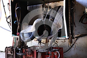 Saddles hanging in a stable