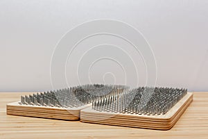 Sadhu wooden board with nails for sadhu practice.