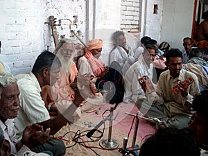 Sadhus and devotees performing bhajan-kirtan