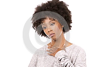 Depressed black casual woman on white background