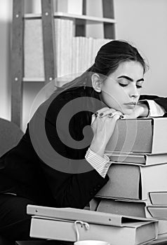 Sadness depressed businesswoman, frustration secretary girl, stressed employee with folders with the documents working